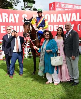 Trainer Pesi Shroff, Miss Anita J Captain and Khushroo Dhunjiboy leading in Fynbos (Trevor Patel up), winner of Zavaray S Poonawalla Bangalore Summer Derby on Sunday.