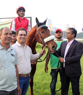 Trainer Karthik Ganapathy (right) leading in Pristine Glory (C S Jodha up), winner of Rajasthan Royals Plate at Mumbai on Thursday.