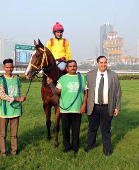 Trainer Bahram Cama leading in Nebula (T S Jodha up), winner of Prince Karim Aga Khan IV Memorial Trophy at Mumbai on Sunday.