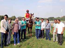 Shambala (Anthony Raj up), winner of Noshir & Dolly Dhunjibhoy Sprint Million being led in by trainer Nazak Chenoy and the winning connections.