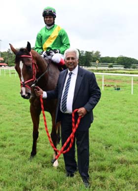 Shine (A Sandesh up), winner of the MYSORE FILLIES TRIAL STAKES 2025 being led in trainer Vijay Singh on Wednesday races at Mysore.